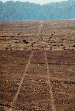 This is an aerial photgraph showing the straight lines that have been drawn in the landscape. They go on for many miles over mountains and up and down valleys