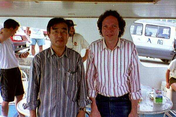 a photo of Dr. Masaaki Kimura, and Dr. Robert M. Schoch