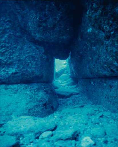 an image of the tunnel beneath the two megaliths (Nimai-iwa)