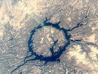 an image/link of the impact crater at Manicougan, Canada, it is also a link to the website where more information on this crater is available if you click the image