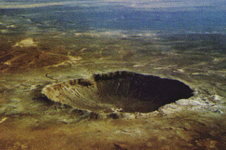 an image of the Barringer impact crater in Arizona, USA, it is also a link to the Barringer Meteor Crater website where more information on this crater is available if you click the image