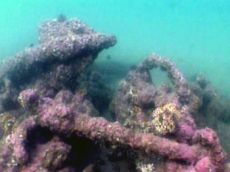 an image showing an anchor from the shipwreck believed to be Blackbeard's flagship, the Queen Anne's Revenge, which is expected to be raised Wednesday due to its unstable position, and which is also a clickable link direct to the Jacksonville Daily News story