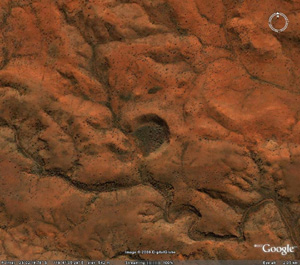 an image/link of the The Hickman Crater as seen on Google Earth from the ScienceAlert website where more information on this crater is available if you click the image