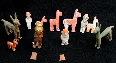 an image of the gold, silver and shell figurines of men and llamas buried alongside six children sacrificed in an Inca ritual, which is also a clickable link directly to the Science News story