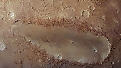 an image/link showing the mysterious elongated impact crater, Orcus Patera on Mars, which is also a link directly to the ESA Mars Express news story