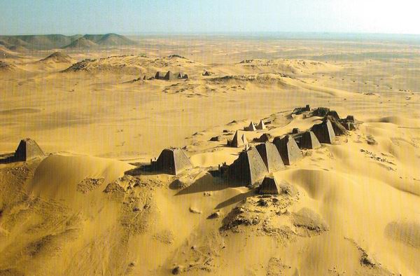 an image of the pyramidal structures at Meroe that are the remnants of an ancient African empire, and which is also a clickable link directly to the Al-Ahram Weekly story
