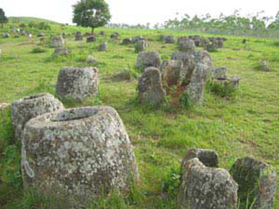 an image of the giant stone jars made from sandstone on the Plain of Jars, Laos, which is also a clickable link directly to the WierdAsia News story