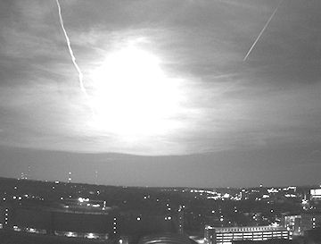 an image/link showing a brilliant midair meteor explosion as seen from a rooftop webcam in Madison, Wisconsin, which is also a link directly to the SpaceWeather.com story