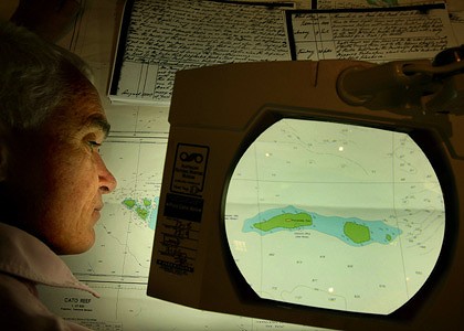an image showing Wreck hunter, Kieran Hosty, with a map of the reef, which is also a clickable link direct to The Sydney Morning Herald story