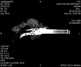 an X-ray image showing the outline of a pistol recovered from an 18th Century shipwreck, which is also a clickable link directly to The St. Augustine Record story